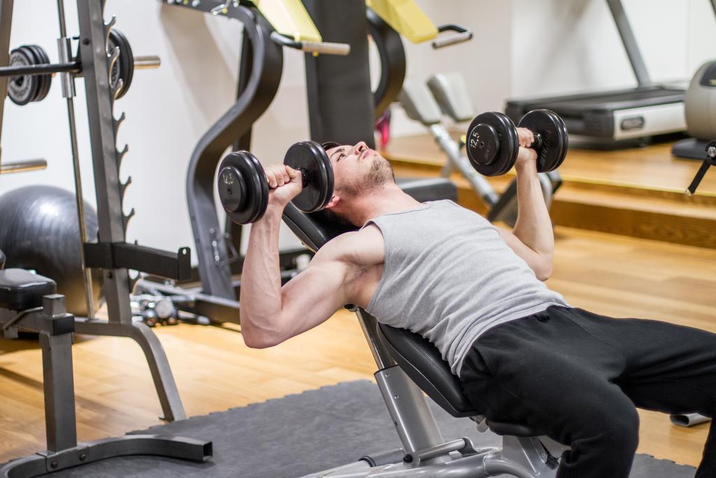 Hotel Atrium Split Exterior photo Dumbbell bench press